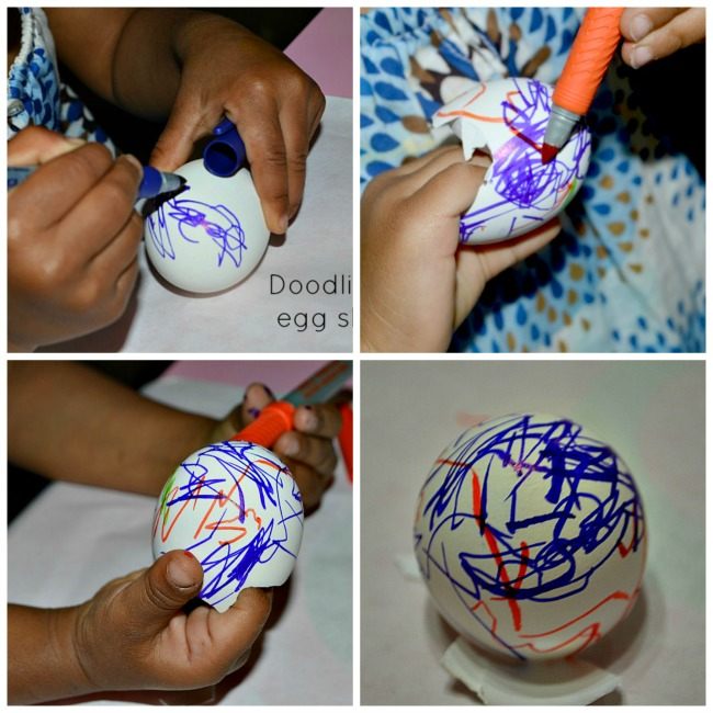 toddler writing on egg shells as fine motor activity