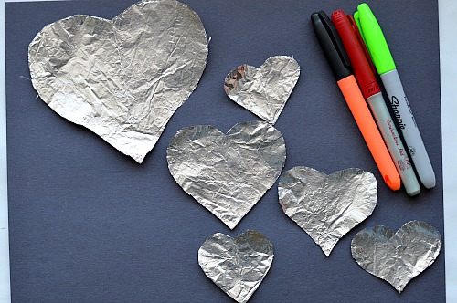 coloring foil hearts for valentine art project