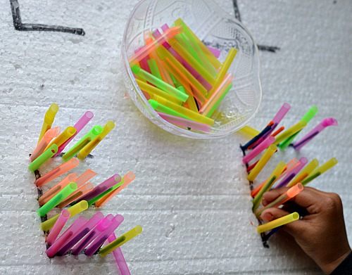 making letters with matches and straw fine motor