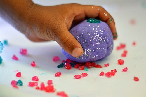 picking up the crystals with playdough