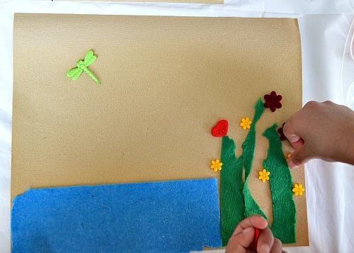kids art on sandpaper with fabric
